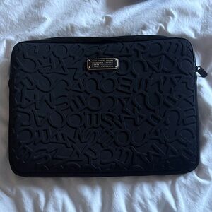 Marc Jacob’s Laptop Sleeve with Embossed Design